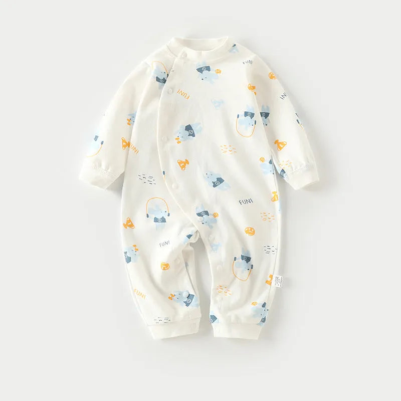 Cotton baby pajamas in cartoon dragon print for a newborn infant.