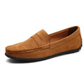 Men's brown suede Gommino-style low-top casual shoes with a round toe and flat rubber sole.