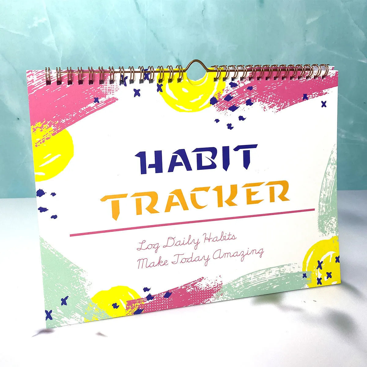 English habit tracking book with 12 pages in A5 size, available in four two-tone colours