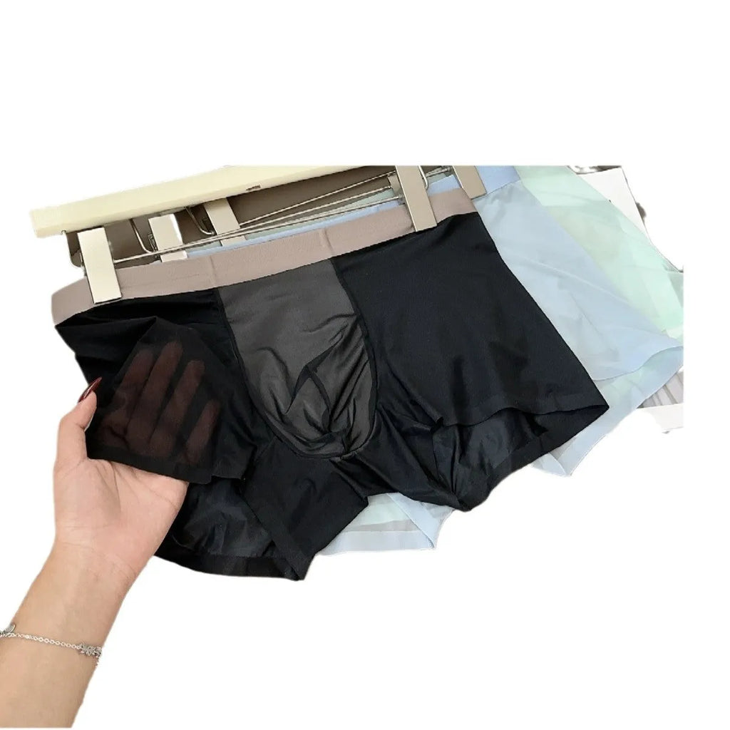 Ultra-thin nude colour men's seamless boxers with honeycomb crotch design on a white background