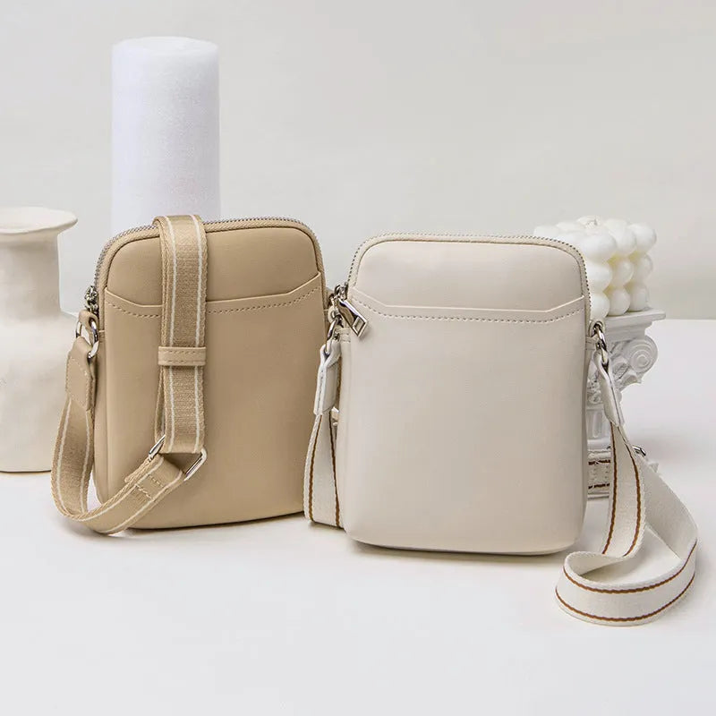 Small solid colour crossbody shoulder bag for mobile phones in beige.