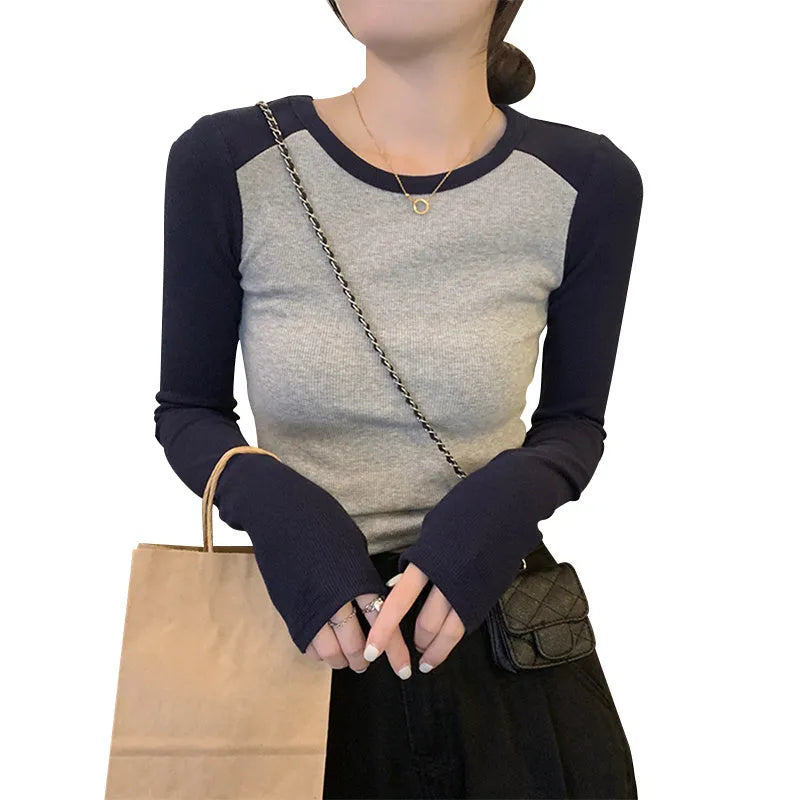 Women's dark blue oversized viscose top with long princess sleeves and embroidery detail.