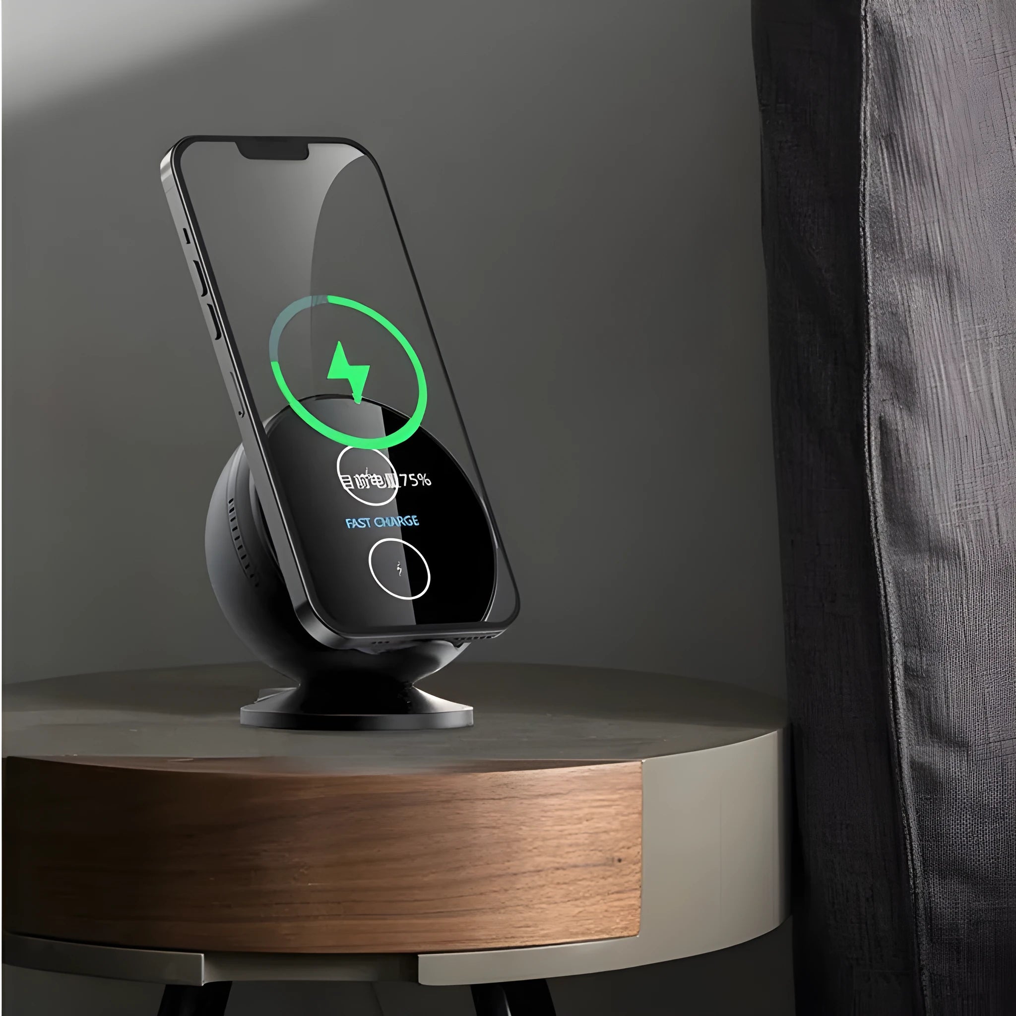 A black multifunctional mobile phone holder with integrated wireless charger and Bluetooth speaker on a desk.