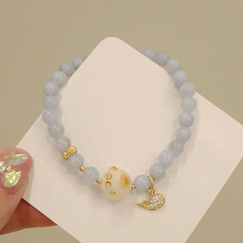 Aquamarine crystal bracelet with gold plated charm pendant for women
