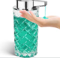 Silver automatic sensor soap dispenser with USB Type-C charging port on a bathroom counter.
