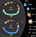 Two natural stone beaded bracelets with zodiac charms on a table, showing adjustable sliding knots.