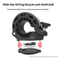 Black aluminium alloy bicycle anti-theft bell with thumb lever on handlebar, showing mounting gaskets and wrench