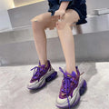 Women's green leather high-top casual sports shoes with a thick sole and cross-tie lace closure.
