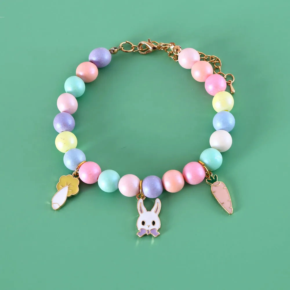 Macaron-coloured dog collar and bracelet set with resin moon, meteor, and rabbit charms in three sizes.