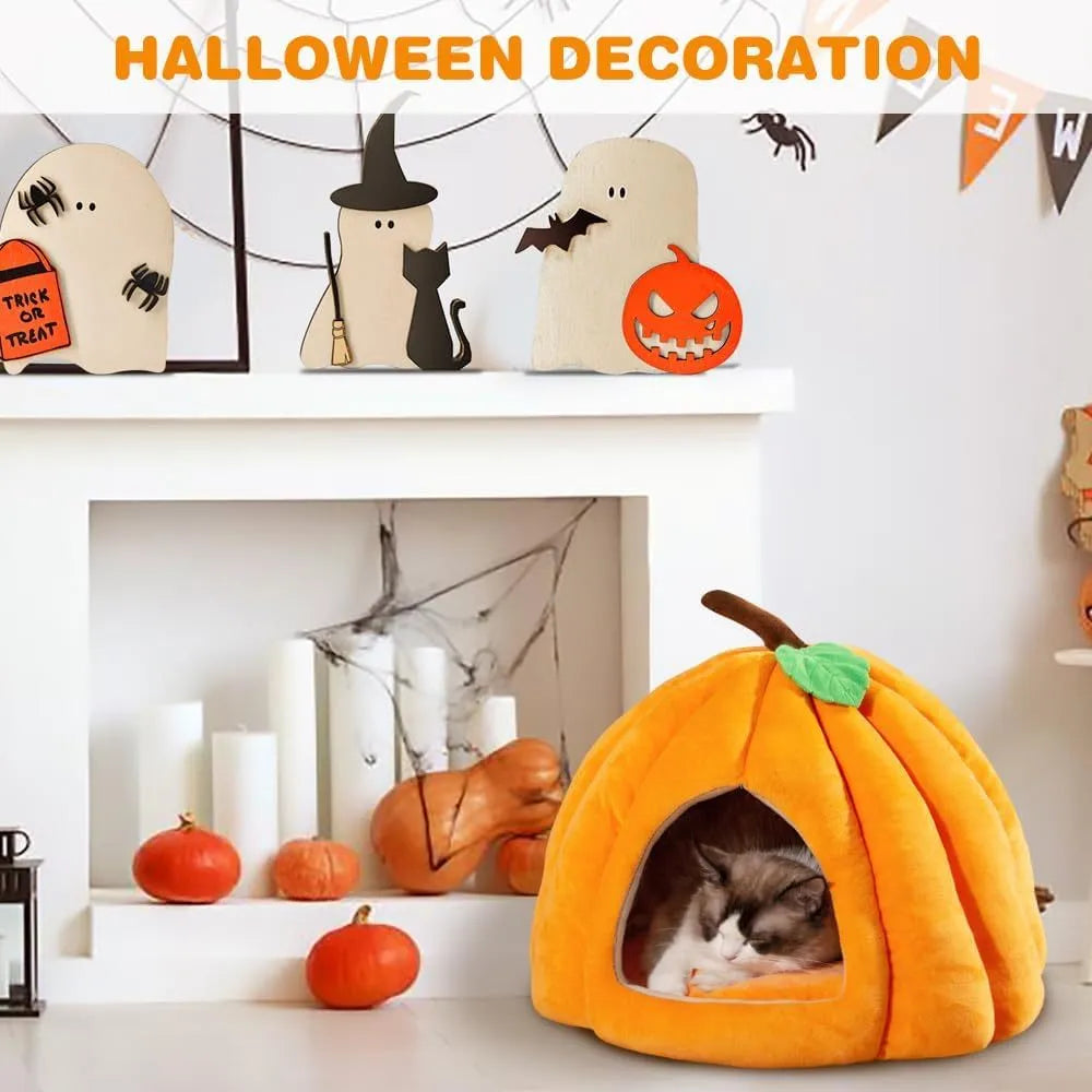 Pumpkin-shaped cat bed in blue, showing semi-enclosed cave design and plush fabric entrance.