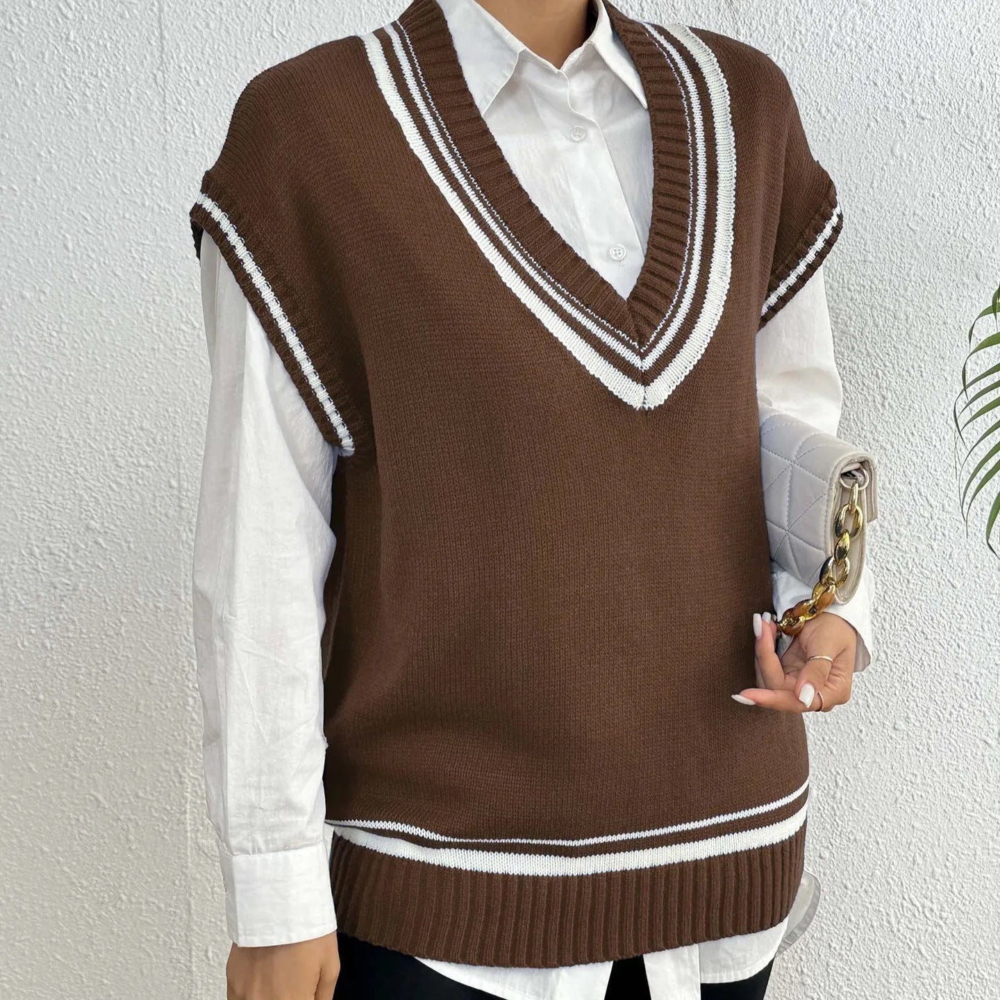Women's loose-fit acrylic college-style pullover vest sweater in black, blue, or coffee.