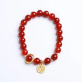 Natural red agate bracelet with woven design and blessing card, shown in 10mm bead size.