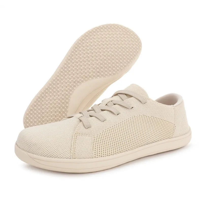 Wide toe barefoot yoga shoes with rubber sole and cotton lining in black, side view