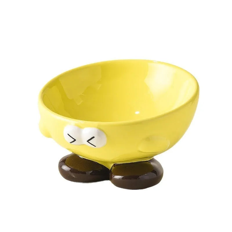 Ceramic slanted pet bowl with cute expression design in blue, yellow, and set colours for cervical spine support.