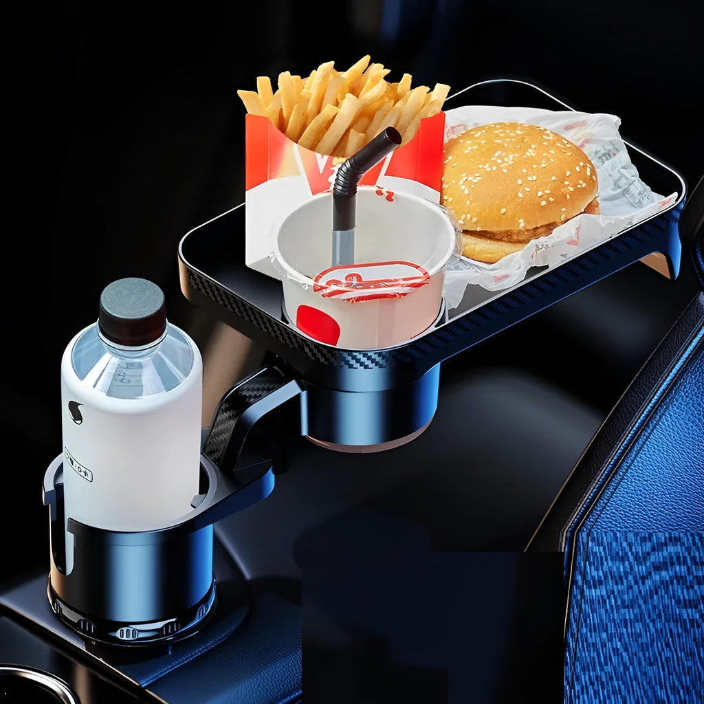Black car cup holder with an integrated rotating dinner tray, shown in a vehicle.