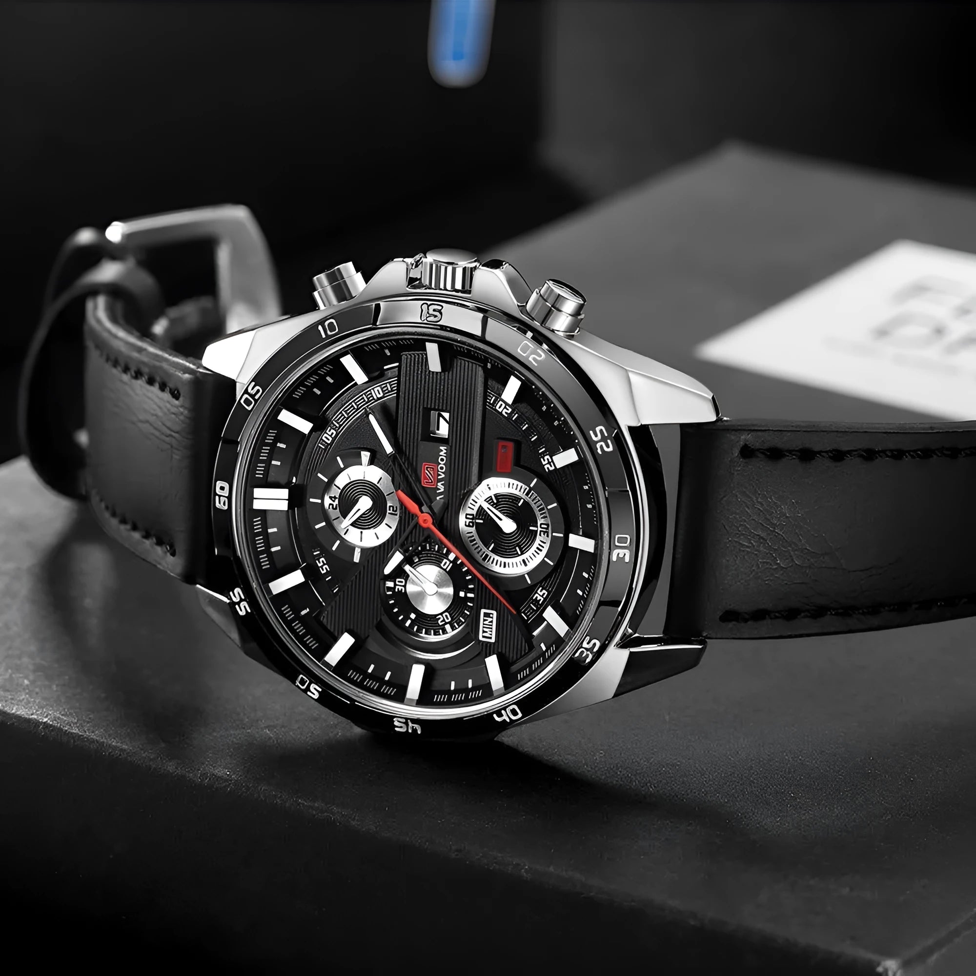 Men's casual watch with date window on dial, available in black leather strap with rose gold case and other colour combinations.
