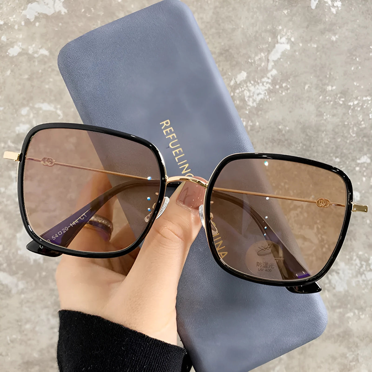 Photochromic myopia glasses with large frame, anti-blue light lens, available in four black gold frame colours