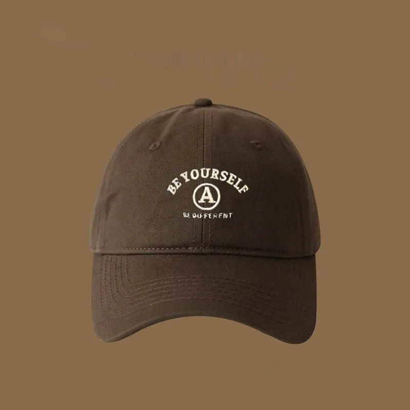 Cotton baseball cap with embroidered couple face, adjustable head circumference, available in six colours