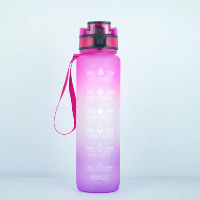 Transparent 1000ml plastic water bottle showing clear Tritan construction with visible liquid