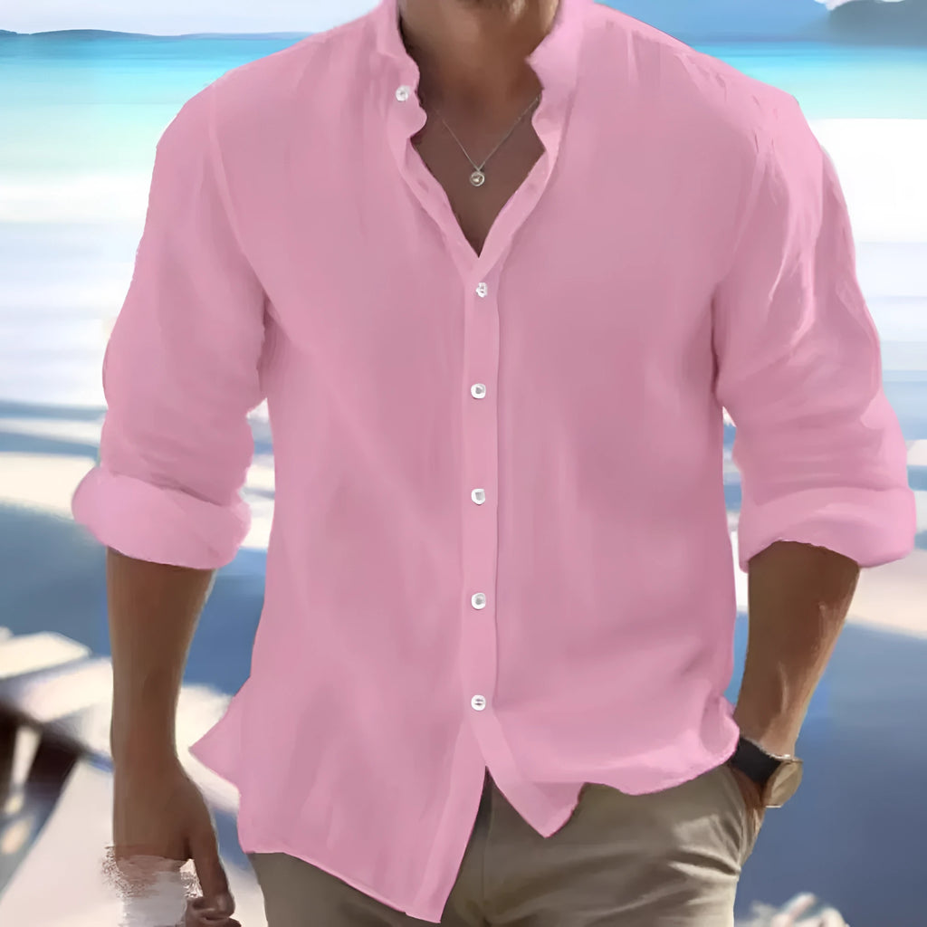 Man wearing a light grey long-staple cotton casual button-up summer shirt.