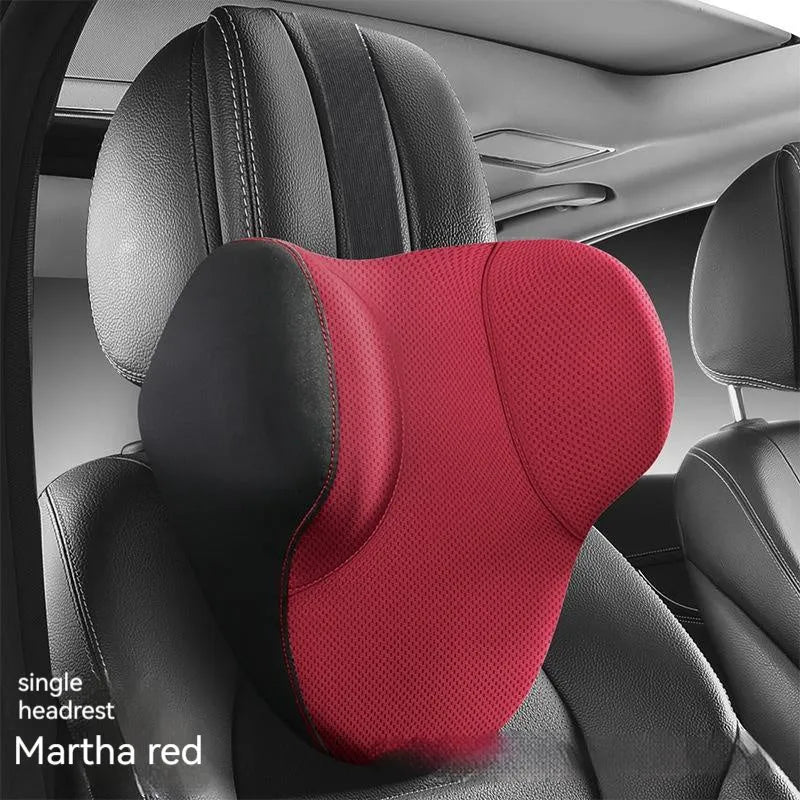 Black memory foam car headrest and lumbar support pillow set on a car seat