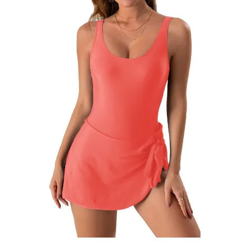 Women's nylon one-piece swimsuit with skirt in floral pattern showing sleeveless design