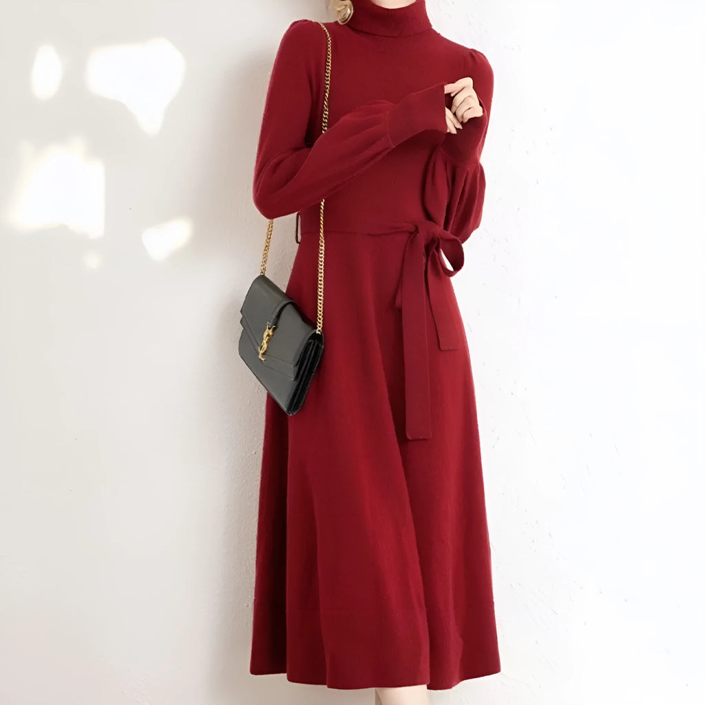 Rose red loose turtleneck knit dress with long sleeves and an elastic waist.