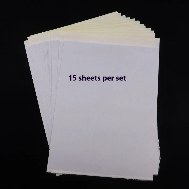 A4 tattoo transfer paper sheets with clear guide lines and a tube of transfer paste gel.