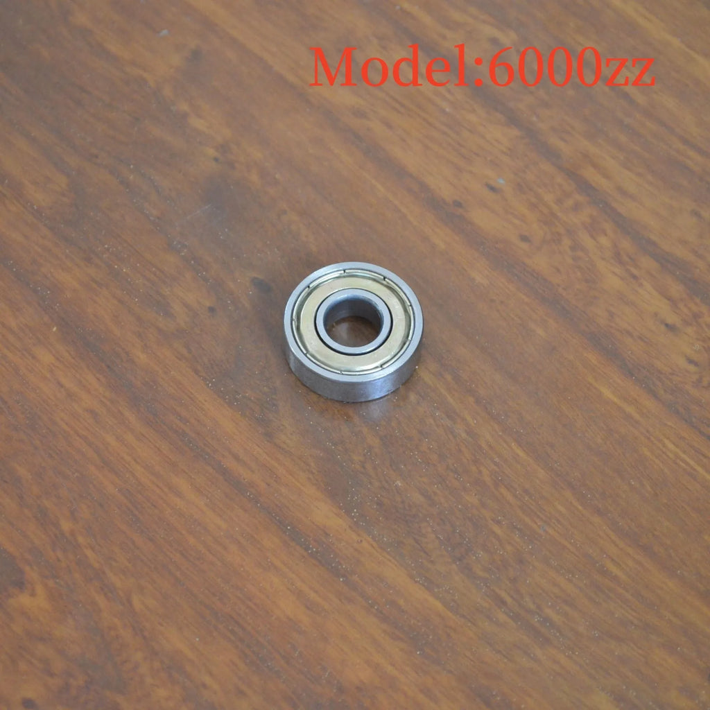6000z carbon steel ball bearing with 10mm inner diameter, 26mm outer diameter, and 8mm width on a white background.
