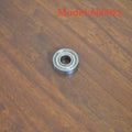 6000z carbon steel ball bearing with 10mm inner diameter, 26mm outer diameter, and 8mm width on a white background.