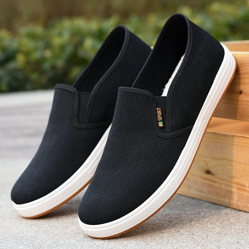Men's black and blue slip-on canvas cloth shoes with round toe and injection moulded sole
