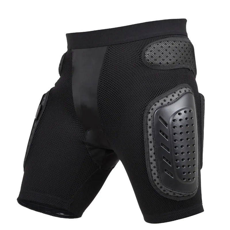 Black cycling protective pants with integrated hip pads, shown in size L for adult mountain bike or BMX use.