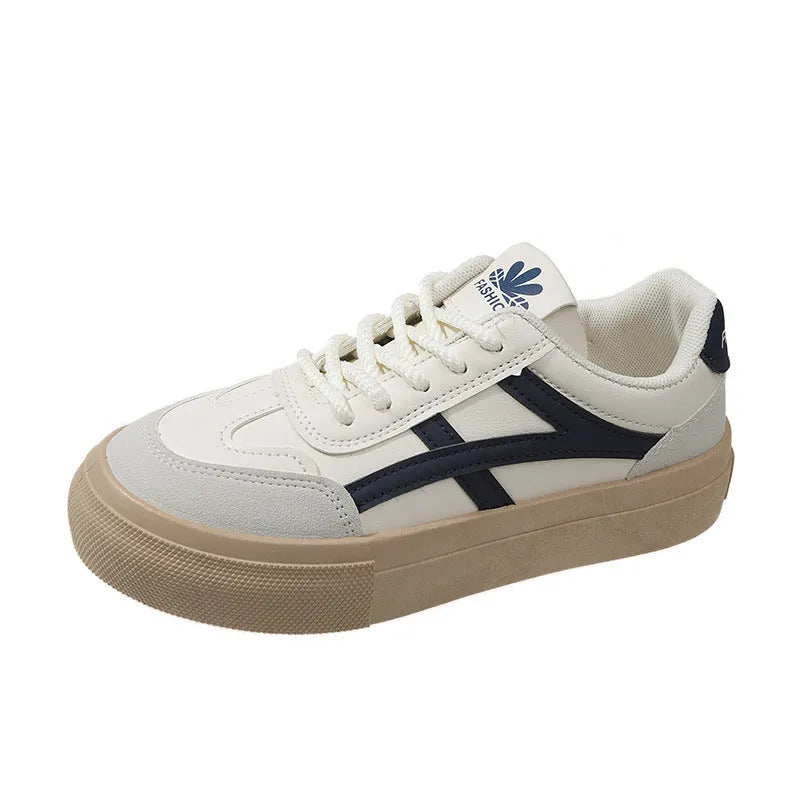 Brown and blue low-top casual lace-up shoes with a round toe and flat rubber sole.