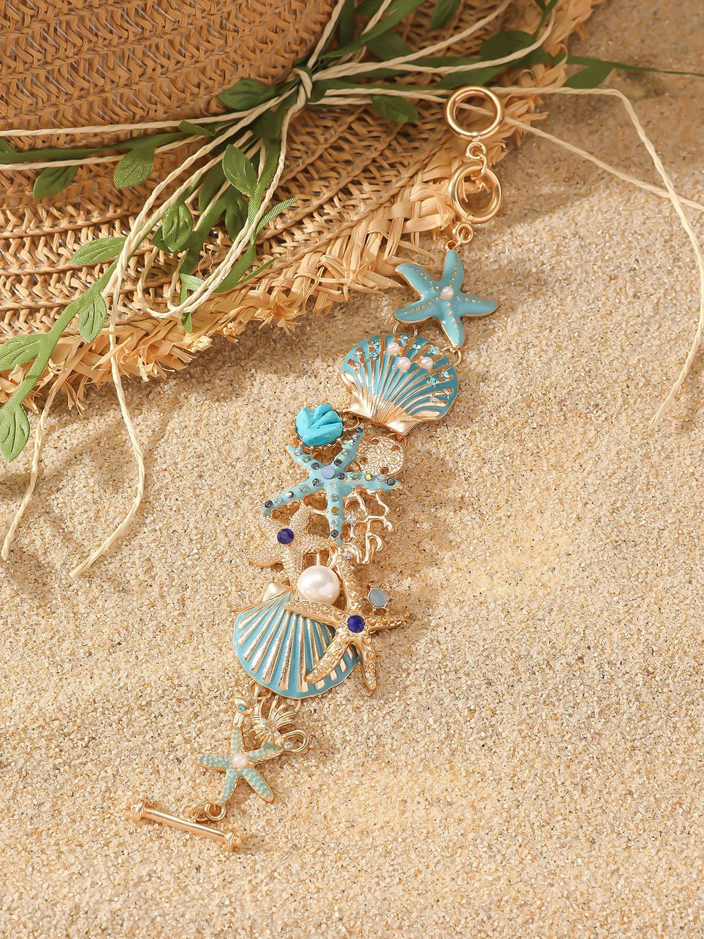 Women's alloy bracelet with starfish, star, and anchor design in turquoise, red, or blue colour.