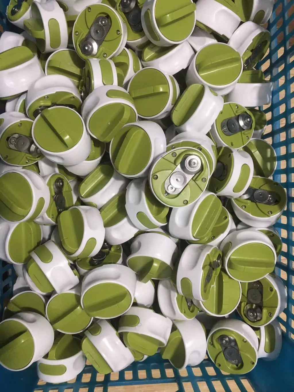 Green stainless steel bottle opener with screw mechanism for jars and bottles