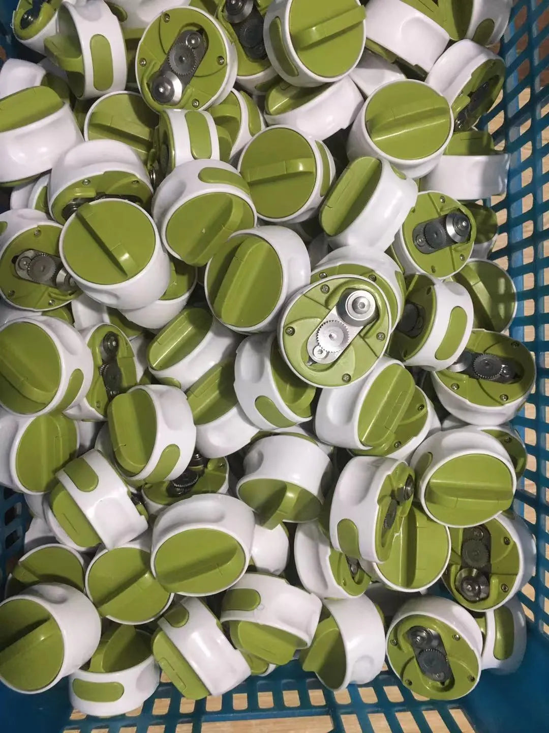 Green stainless steel bottle opener with screw mechanism for jars and bottles