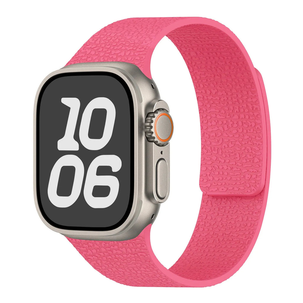 Magnetic silicone Apple Watch strap with litchi pattern, shown in orange, sizes 38-49mm