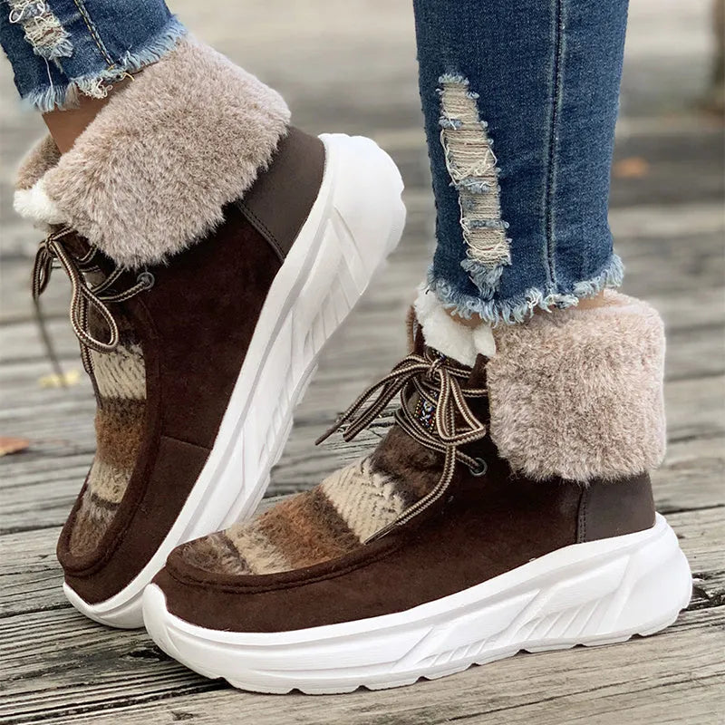 Women's beige fuzzy suede lace-up snow boots with thick rubber sole and plush lining.