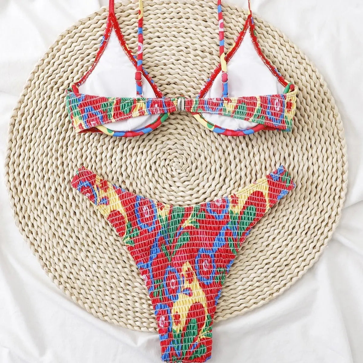 Red floral print women's two-piece underwire bikini set on a white background