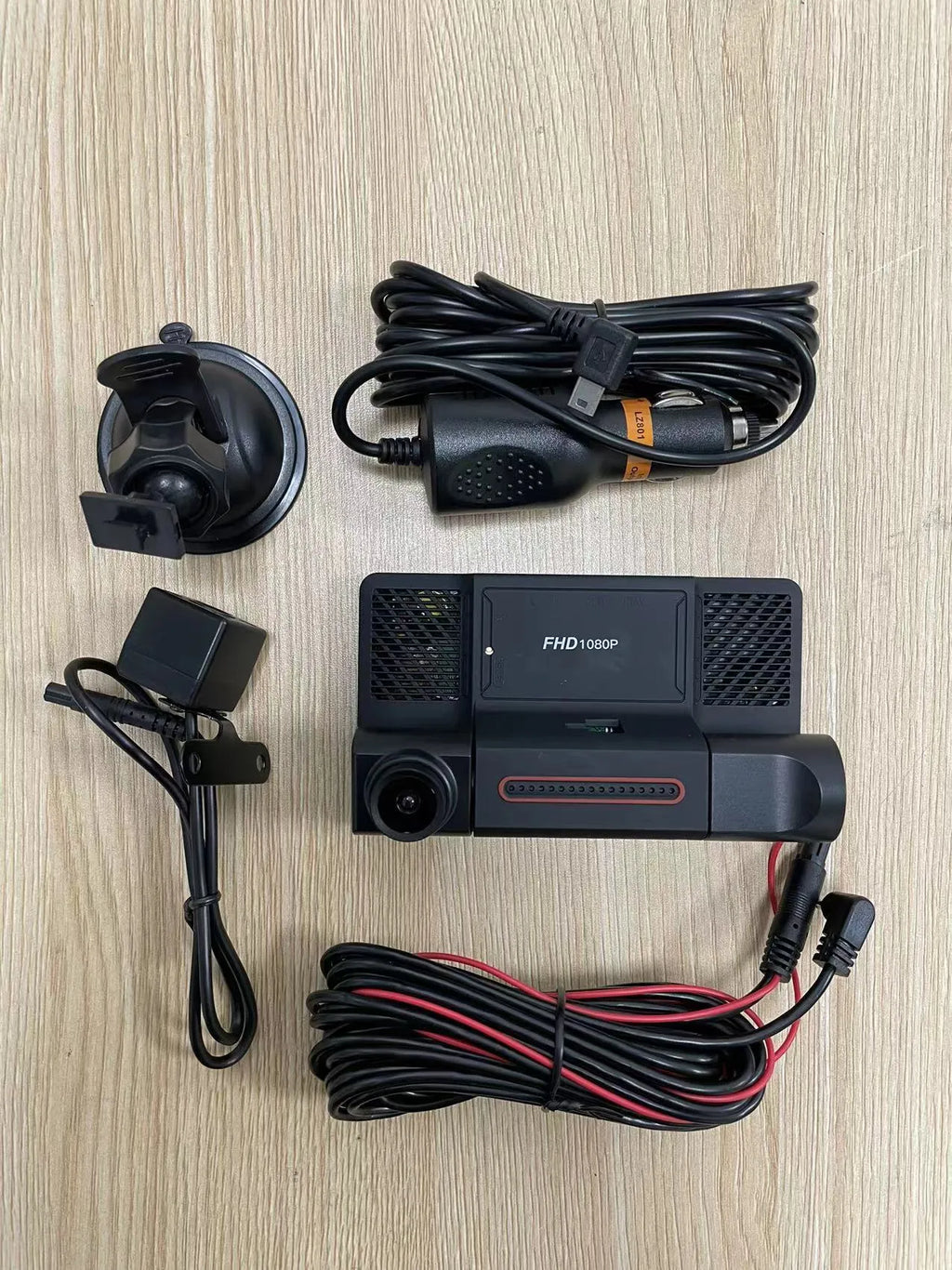 Three lens car dashcam with 4-inch touch screen display showing front, rear and interior camera views