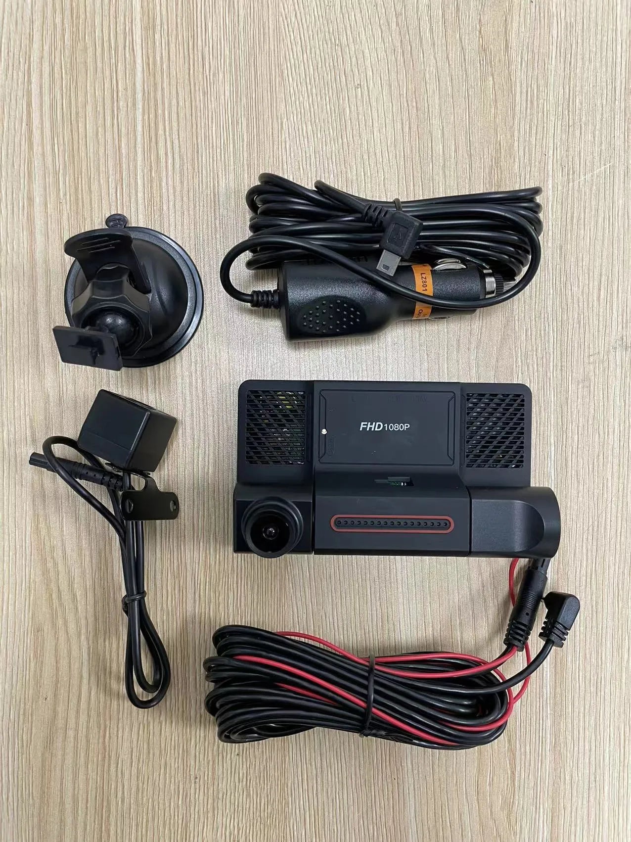 Three lens car dashcam with 4-inch touch screen display showing front, rear and interior camera views