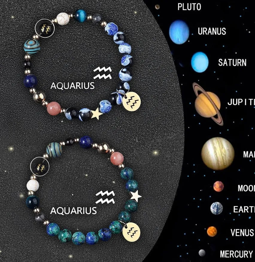 Two adjustable natural stone beaded bracelets with zodiac charms on a wooden surface.