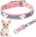 Reflective adjustable PU leather dog collar with metal buckle and decorative paw rivet.