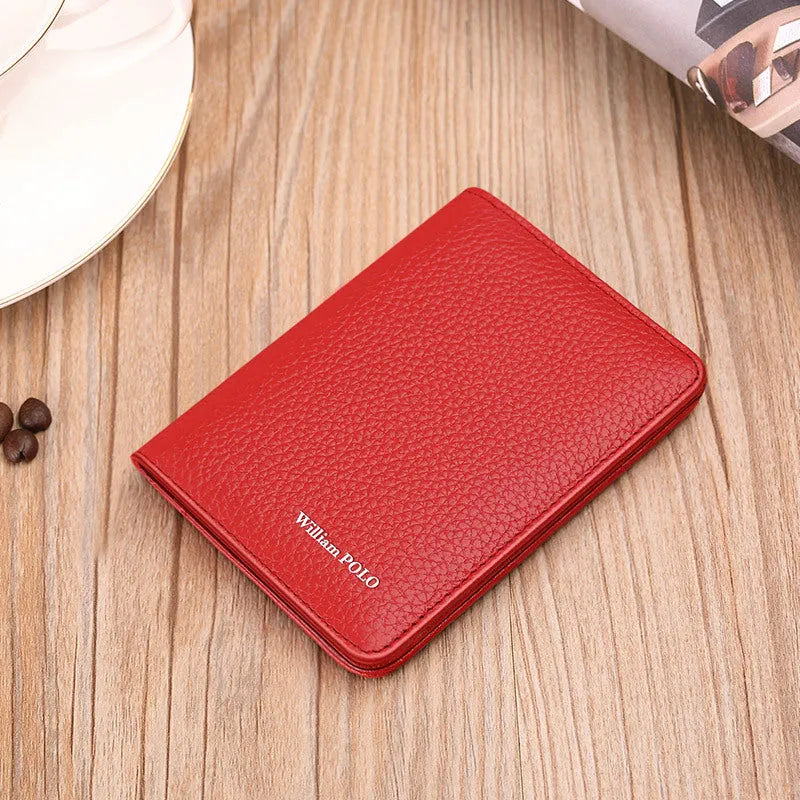 Ultra-thin cowhide leather card ID wallet in solid colour black on flat surface