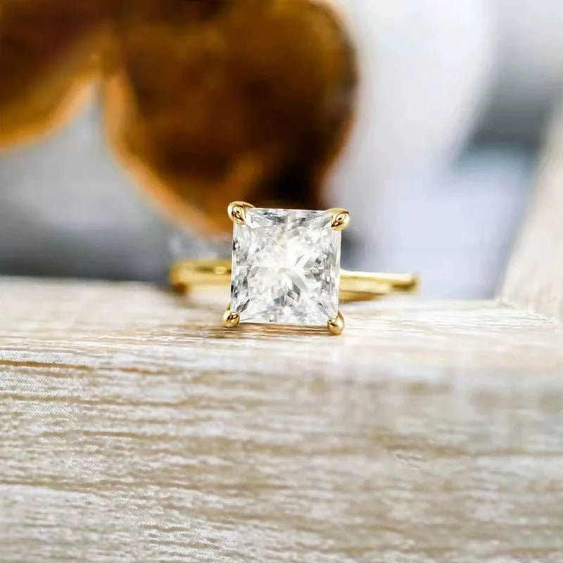 Simple geometric 925 silver ring shown in silver, gold, and rose gold colour options on a plain background.