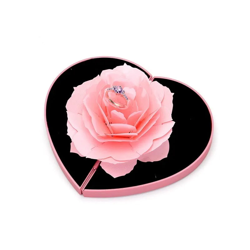 Red heart-shaped rotating ring box with 3D love design and rose flower pattern for jewellery storage