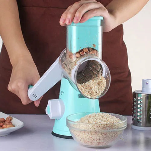 Round manual kitchen mandoline slicer with stainless steel blades in blue, green, or red colour options