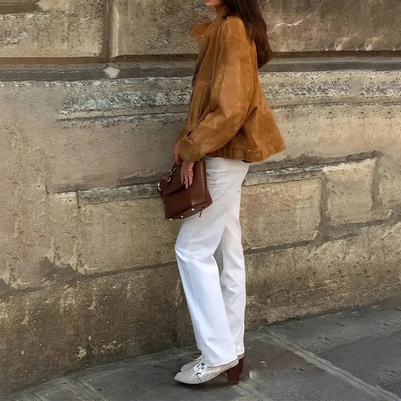 Retro solid colour loose-fit long sleeve jacket on a hanger.