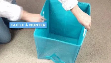 Blue folding detachable storage basket with clear front panel on a shelf, showing lift-up rod.