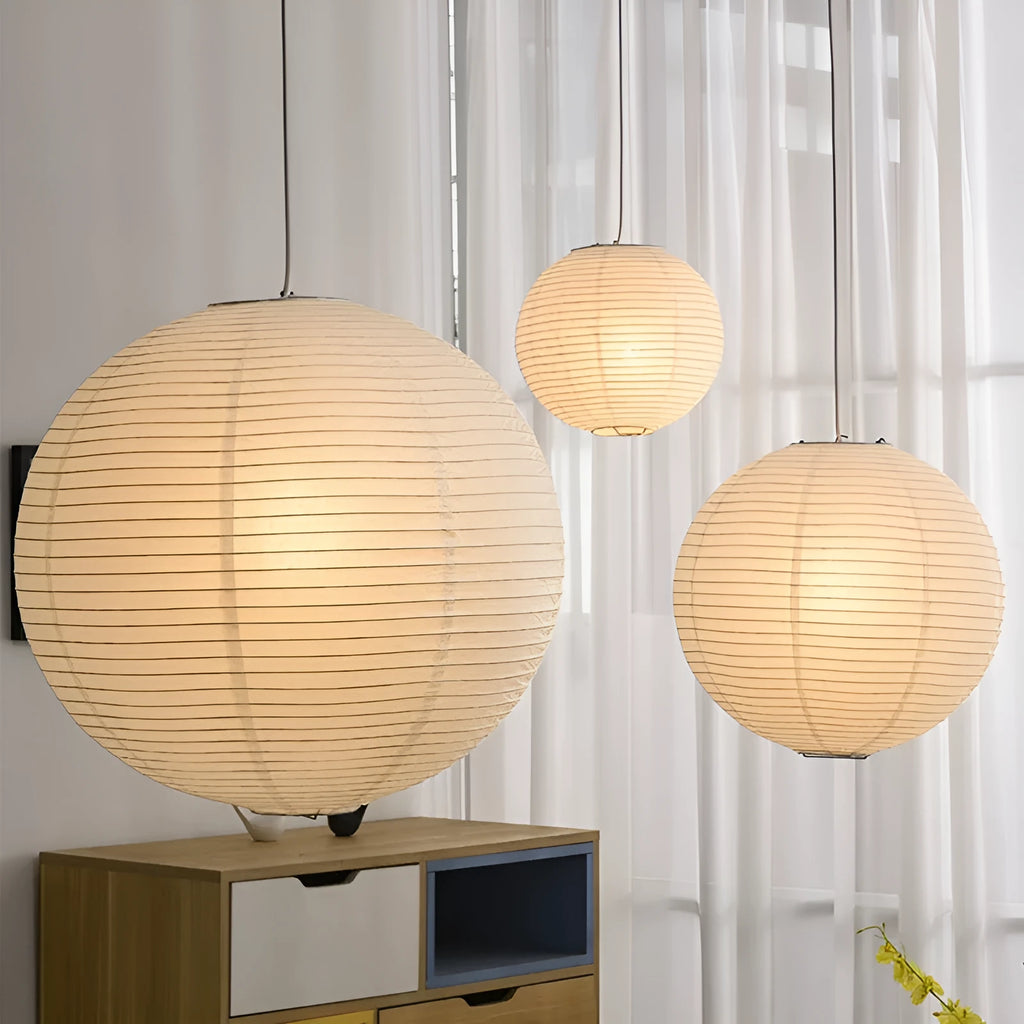Modern simple pendant lamp with a round paper shade, shown in different diameter sizes for ceiling lighting.